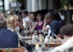 Amsterdam 3 juli 2012
Bryan Roy met een kennis op terras.
Peter Smulders bv
