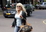 Amsterdam 6 juli 2012
Patricia Paay en vriend Nicky v Dam op de cornelis schuytstraat.
Peter Smulders bv