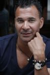 Amsterdam 3 juli 2012
 Ruud Gullit met nialaya armband op de cornelis schuytstraat.
Peter Smulders bv
