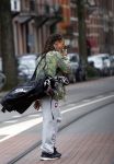 Amsterdam 13 juni 2016
Edgar davids met golftas op straat in Amsterdam zuid.