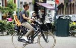 Amsterdam 22 juni 2016  
Ronald de Boer met zijn dochter op de fiets.