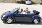 ibiza 27 juni 2016
Sonja Bakker met man Jan Reus en zoon Bram bij cala Bassa. Ze rijden in een VW kever cabrio.
