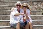 ibiza 27 juni 2016
Sonja Bakker met man Jan Reus en zoon Bram bij cala Bassa. Ze rijden in een VW kever cabrio.