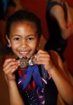 Amsterdam 17 juni 2018
De dochter van Edsilia Rombley en Tjeerd Oosterhuis wint medailles met turnen