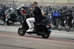 Amsterdam 11 juni 2018
Tim Douwsma op de scooter in het centrum van Amsterdam.