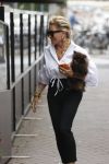 Amsterdam 10 juli 2021
Connie Witteman met haar hondje ,dochter Constanza en kleinkinderen in 2 biro karretjes in Amsterdam zuid