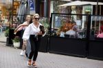 Amsterdam 10 juli 2021
Connie Witteman met haar hondje ,dochter Constanza en kleinkinderen in 2 biro karretjes in Amsterdam zuid