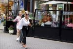 Amsterdam 10 juli 2021
Connie Witteman met haar hondje ,dochter Constanza en kleinkinderen in 2 biro karretjes in Amsterdam zuid