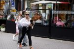 Amsterdam 10 juli 2021
Connie Witteman met haar hondje ,dochter Constanza en kleinkinderen in 2 biro karretjes in Amsterdam zuid