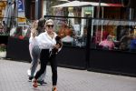 Amsterdam 10 juli 2021
Connie Witteman met haar hondje ,dochter Constanza en kleinkinderen in 2 biro karretjes in Amsterdam zuid