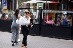 Amsterdam 10 juli 2021
Connie Witteman met haar hondje ,dochter Constanza en kleinkinderen in 2 biro karretjes in Amsterdam zuid