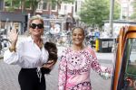 Amsterdam 10 juli 2021
Connie Witteman met haar hondje ,dochter Constanza en kleinkinderen in 2 biro karretjes in Amsterdam zuid
