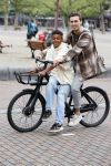 Amsterdam 29 juni 2021
Shane Kluivert en zijn broer Nino Wilkes fietsend op het museumplein