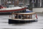 Amsterdam 5 juni 2025
Zanger Sting komt met een boot aan bij Carre om musical THE LAST SHIP te promoten . Het was ongelofelijk slecht weer maar desondanks stonden er toch honderden fans op hem te wachten .
