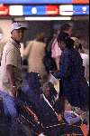 Schiphol amsterdam 24 juni 1999
Patrick Kluivert voor vertrek naar zijn vakantieland samen met vriendin en twee kinderen