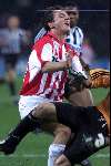 Eindhoven, 23 november 2000
UEFA Cup wedstrijd PSV-PAOK Thessaloniki, eindstand
Arnold Bruggink wordt onderuit gelopen door doelman Kyriakos