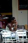 Amsterdam 21 juli 2003
Edsilia Rombley  op terras met gsm