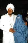 Zaandam 4 juli 2003
Ellen v Rijn  gesluierd met vriend