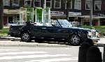 Amsterdam 18 juli 2003
Jack v Gelder in Rolls Royce Cabrio met zijn vrouw samen
op terras