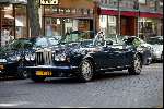 Amsterdam 18 juli 2003
Jack v Gelder in Rolls Royce Cabrio met zijn vrouw samen
op terras