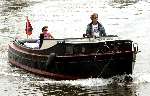Amsterdam  8 juli 2003
Jeroen Pauw  en Daphne Bunskoek op boot