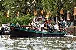 Amsterdam 15 juli 2003
Robbie Williams varen op boot in Amsterdam