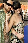Amsterdam 29 juli 2004
Premiere I Robot in Pathe Arena.
Birgit Schuurman met vriend Arne met zonnebril en tatoeage