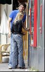 Amsterdam 1 juli 2004
Xander de Buisonje met  Marie (duits fotomodel) op v Baerlestraat