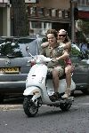 Amsterdam 18 juli 2005
Dirk Zeelenberg met vriendiop vespa scooter op cornelis schuytstraat