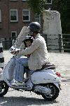Amsterdam 13 juli 2005
Ruud Gullit met zijn zoon Maxim op vespa scooter