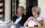 Amsterdam  28 juli 2005
Rijk de Gooijer op terras met zijn vriendin Nel.