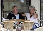 Amsterdam  28 juli 2005
Rijk de Gooijer op terras met zijn vriendin Nel.