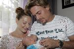 Rotterdam 22 juli 2005
Winston Post en Denise v Rijswijk met hun zoon Jayden