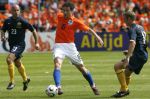 Rotterdam, 5 Juni 2006 Laatste oefeninterland nederlands elftal op weg naar het WK 2006 in Duitsland.
Nederland-Australie, eindstand 1-1
Tong uit de mond bij Mark v Bommel
© Edwin van Zandvoort