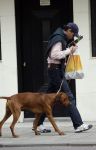 Amsterdam 30 mei 2007
Edwin de Roy v Zuydewijn met zijn hond op straat.