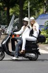 Amsterdam 7 juni 2007
Regilio Tuur met zijn vriendin op vespa scooter met allebei een hoed op.