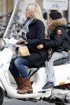 Amsterdam 15 januari 2009
Angela Kluivert met Justin op de vespa scooter
Peter Smulders bv