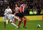 Eindhoven, 12 Maart 2008
UEFA 1/8 finale PSV-Tottenham Hotspur FC, eindstand 0-1
PSV wint na verlenging en straschoppen met 6-5 en gaat door naar de 1/4 Finale
Danny Koevermans wordt belaagd door Ledley King