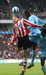 Eindhoven, 13 April 2008 Kampioenswedstrijd PSV-FC Twente, eindstand 1-1 Seizoen 2007/2008. PSV daardoor nog niet kampioen.
Danny Koevermans in een luchtduel met Douglas