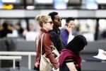 Amsterdam Schiphol 1 mei 2009
Doutzen Kroes heeft samen met haar vriend Greg Andrews Koninginnedag 2009 gevierd in Amsterdam. Zij vloog de volgende dag naar het Filmfestival in 
Cannes (Fr.)