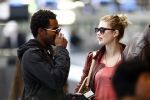 Amsterdam Schiphol 1 mei 2009
Doutzen Kroes heeft samen met haar vriend Greg Andrews Koninginnedag 2009 gevierd in Amsterdam. Zij vloog de volgende dag naar het Filmfestival in 
Cannes (Fr.)