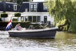Nigtevecht, 24 Mei 2009
Edwin Smulders met zijn zwangere vrouw Anouk Smulders in hun sloep varend over de Vecht richting Muiden
