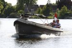 Nigtevecht, 24 Mei 2009
Edwin Smulders met zijn zwangere vrouw Anouk Smulders in hun sloep varend over de Vecht richting Muiden