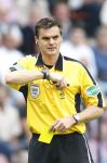 Eindhoven, 23 September 2007 Seizoen 2007/2008 Kompetitewedstrijd PSV-Feyenoord, eindstand 4-0
Scheidsrechter Eric Braamhaar geeft een gele kaart