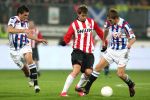 Seizoen 2008-2009 Heerenveen 29-11-2008 
sc Heerenveen - PSV uitslag 2-2. 
Aktie van Danko Lazovic met Goran Popov en Michal Svec.
Foto Peter Smulders BV