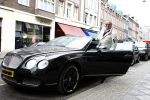 Amsterdam 29 maart 2008
Gordon met zijn bentley cabrio op de pc hooftstraat.
