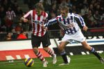 Eindhoven, 20 Januari 2007 Eerste wedstrijd na winterstop Kompetitiewedstrijd tussen PSV-SC Heerenveen, eindstand 3-1 Seizoen2006/2007
Mika Vayrynen in duel met Jakob Poulsen
Foto Peter Smulders BV