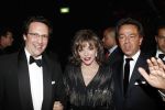 Amsterdam 6 december 2007
Miljonairsfair 2007 in de rai te amsterdam. Vip avond. Joan Collins opende de beurs samen met organisator Yves Gijraths. Joan met vriend