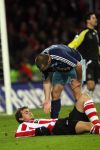 Eindhoven, 19 Maart 2008 Kompetitiewedstrijd PSV-AJAX, eindstand 0-0 
Seizoen 2007/2008
John Heitinga heeft Danko Lazovic onderuit gehaald