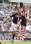 Eindhoven, 23 September 2007 Seizoen 2007/2008 Kompetitewedstrijd PSV-Feyenoord, eindstand 4-0
Kevin Hofland in duel met Timmy Simons & Eric Addo